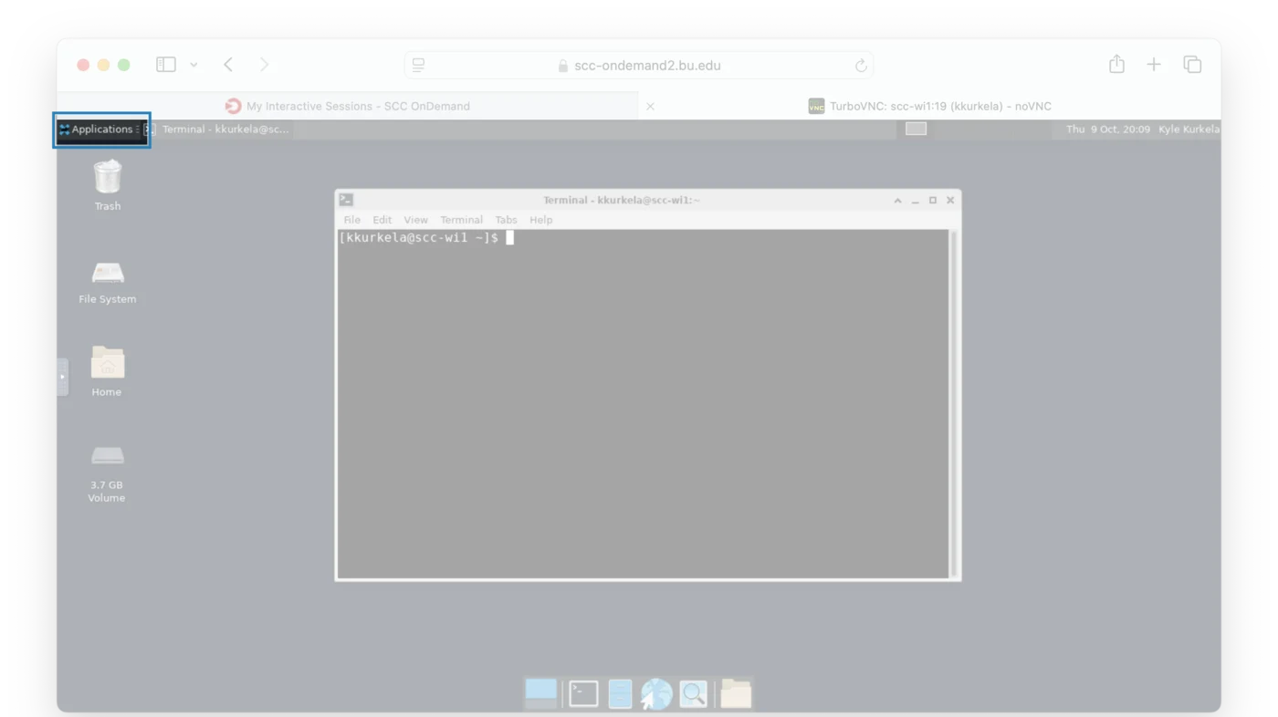 The desktop with the Applications menu, at the far left of the top bar, highlighted.